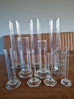 Diverse glazen maatcilinders en een maatbeker, Ophalen, Zo goed als nieuw