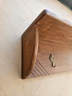 Houten kapstok, Ophalen
