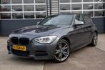 BMW 1 Serie M135i F20 M Sport xDrive High Executive / Leer, Auto's, BMW, Origineel Nederlands, Te koop, Huisgarantie, Zilver of Grijs