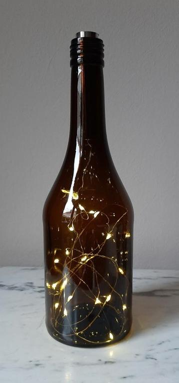 Leuke fles met sfeerverlichting  beschikbaar voor biedingen
