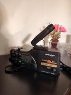 Zwarte sharp camera, Ophalen, Camera