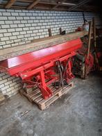 Kunstmest strooier, Ophalen