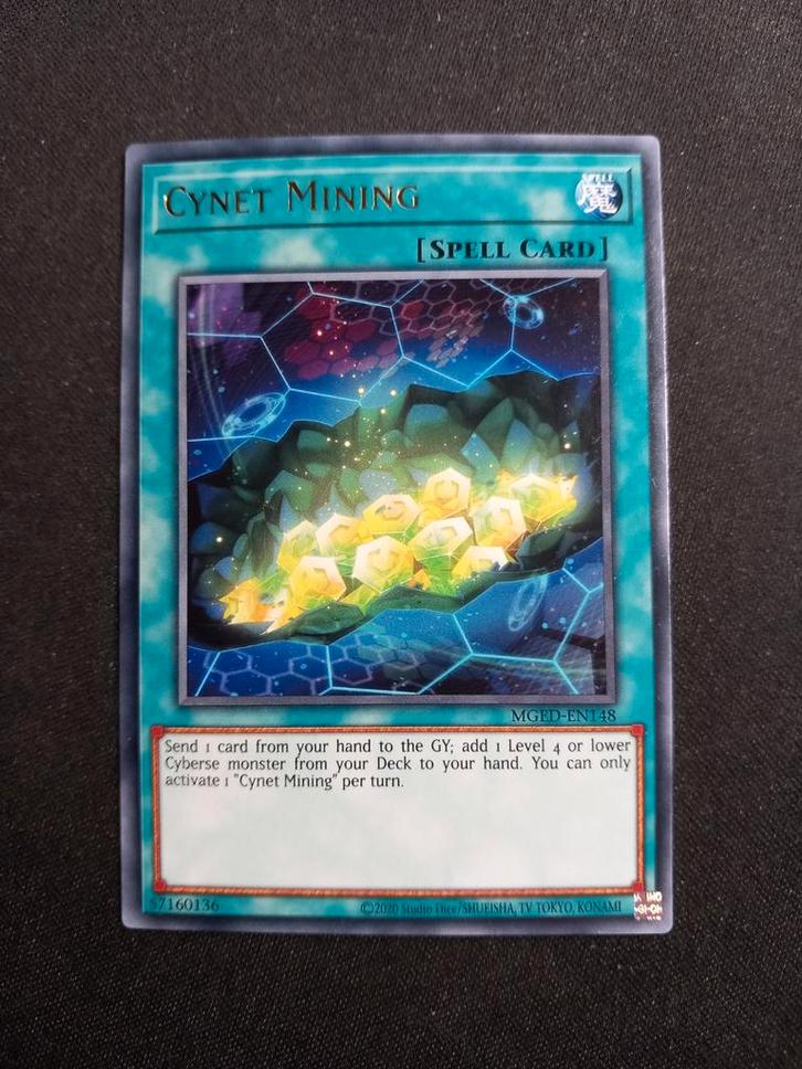 Maximum Gold: El Dorado Cynet Mining 148 NM, Hobby en Vrije tijd, Verzamelkaartspellen | Yu-gi-Oh!, Zo goed als nieuw, Losse kaart