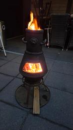 Oude gietijzeren tuinkachel met leeuwenkop, Ophalen, Gebruikt