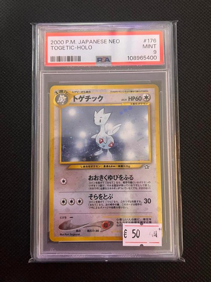 PSA 9 Togetic Holo - Neo Genesis Japans, Hobby en Vrije tijd, Verzamelkaartspellen | Pokémon, Zo goed als nieuw, Losse kaart, Foil