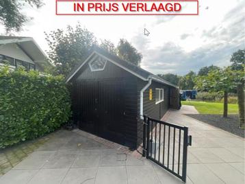 Houten garage met dakpannen extra lang beschikbaar voor biedingen