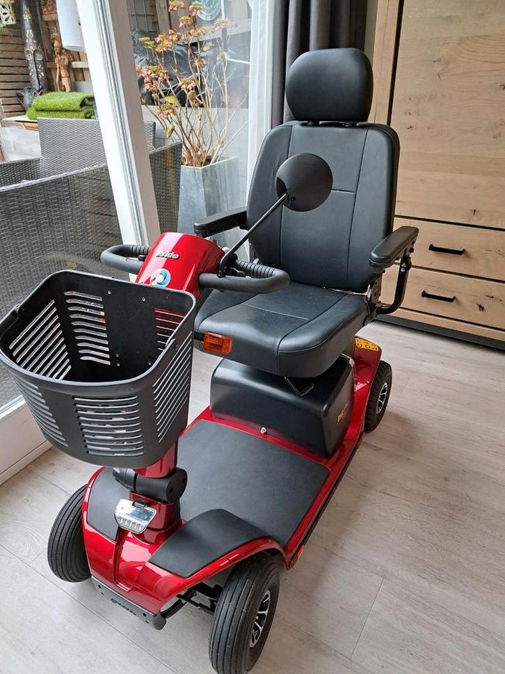Scootmobiel van het merk Pride rood van kleur bijna nieuw, Diversen, Brommobielen en Scootmobielen, Zo goed als nieuw, Pride, 36 t/m 45 km