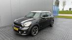 Mini Countryman 1.6 Cooper S All4 AUT 2011 Zwart, Auto's, Mini, 74 €/maand, Stoelverwarming, Zwart, Leder