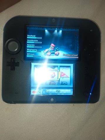 Nintendo 2ds met mario kart, mario 3d land en yoshi island beschikbaar voor biedingen