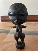 Vruchtbaarheidspop houtsnijwerk, Ophalen