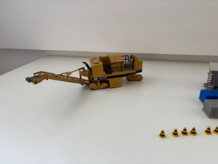 Caterpillar PR-450 freesmachine 1:50, Hobby en Vrije tijd, Modelauto's | 1:50, Gebruikt, Overige typen, NZG, Ophalen of Verzenden