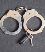 USA Handboeien met holster, Ophalen of Verzenden, Overige soorten, Amerika, Overige typen