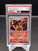 Charizard uit het set Shinning Darkness 1ed PSA 9 Japans, Losse kaart, Zo goed als nieuw, Verzenden