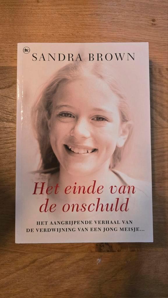 Sandra Brown - Het einde van de onschuld, Boeken, Literatuur, Zo goed als nieuw, Ophalen of Verzenden