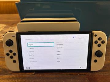 Nintendo Switch Oled incl. 4 games beschikbaar voor biedingen