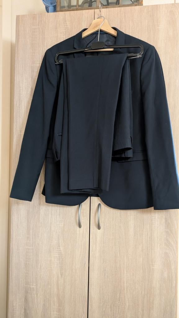 Heren kostuum, Ophalen of Verzenden, Zo goed als nieuw, Maat 52/54 (L), Grijs