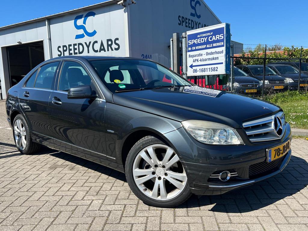 Mercedes-Benz C-Klasse C180 Kompr. Sedan 2009 Half Leer, Leder en Stof, Handgeschakeld, Parkeersensor, Sedan