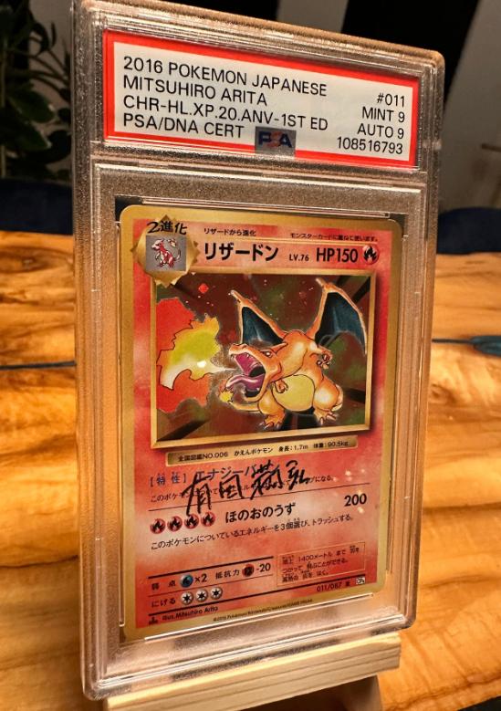 1st edition Charizard met handtekening Arita PSA 9, Verzenden, Zo goed als nieuw, Losse kaart