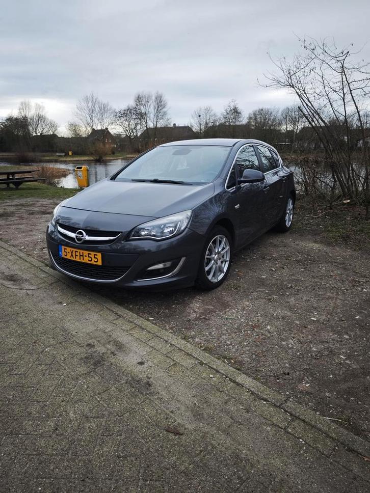 Opel Astra 1.4 Turbo  140pk 2012 Grijs, Auto's, Opel, Particulier, Astra, ABS, Achteruitrijcamera, Airbags, Airconditioning, Android Auto