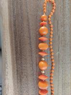 Oranje kralenketting met diverse kralen, Ophalen of Verzenden, Gebruikt, Oranje, Kunststof