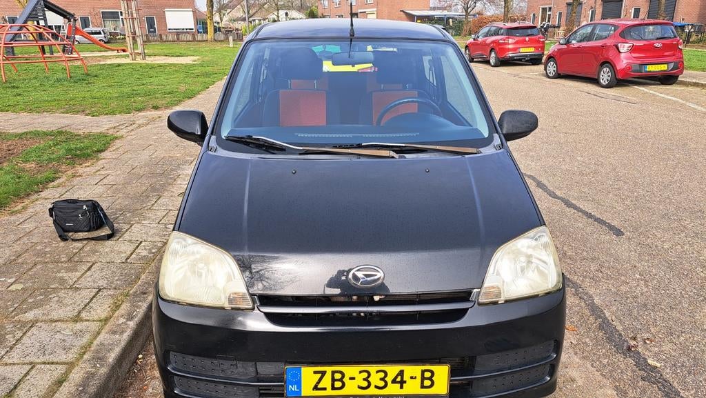 Daihatsu Cuore 1.0 Tokyo 3D 2006 Zwart, Auto's, Daihatsu, Stof, 600 kg, Zwart, 18 €/maand