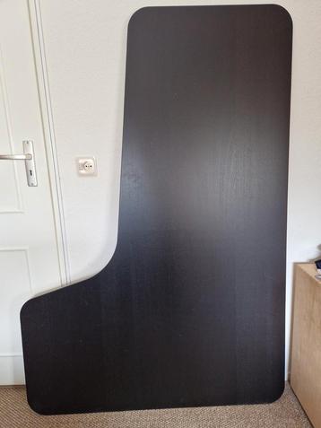 Ikea bureau blad zwart met 2 poten, licht beschadigd 