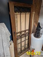 Oude deur met sierlijk ijzerwerk - mancave decoratie, Ophalen