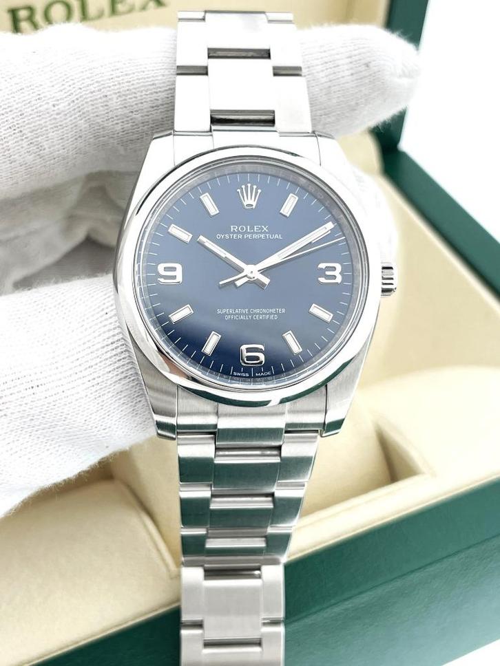 Rolex Oyster Perpetual 114200 Staal Blue Baton Arabic Dial, Sieraden, Tassen en Uiterlijk, Horloges | Heren, Zo goed als nieuw
