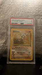 PSA 5 - Hitmonlee Holo - Fossil, Ophalen of Verzenden, Zo goed als nieuw, Losse kaart