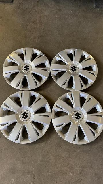 set suzuki wieldoppen 14 inch beschikbaar voor biedingen