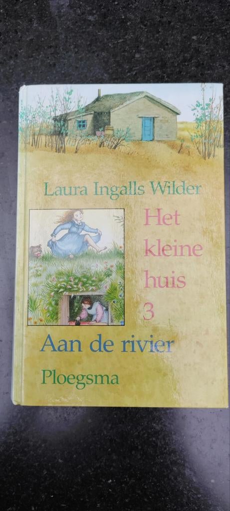 Het kleine huis aan de rivier - Laura Ingalls Wilder, Ophalen of Verzenden, Zo goed als nieuw, Laura Ingalls Wilder, Fictie algemeen