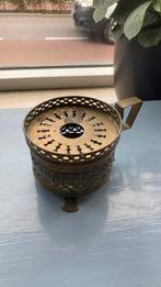 Koperen theelicht in perfecte staat, Ophalen