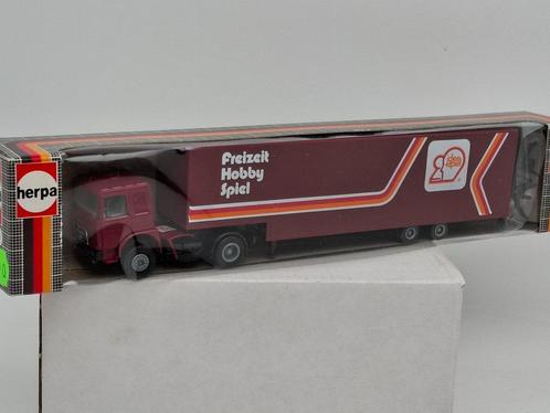 MAN vrachtwagen met semi dieplader trailer - Herpa 1/87, Hobby en Vrije tijd, Modelauto's | 1:87, Zo goed als nieuw, Bus of Vrachtwagen