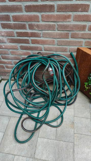Tuinslang 20 meter met aan 1 zijde een koppeling  beschikbaar voor biedingen