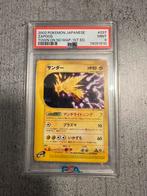 PSA 9 - FIRST ED 2002 Pokémon Japanese Zapdos Town On No Map, Ophalen of Verzenden, Nieuw, Overige typen