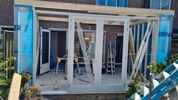 Hardhout kozijn met dubbele tuindeuren en zijramen  beschikbaar voor biedingen