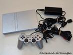 PlayStation 2 Slimline met Controller & Bedrading (Zilver), Spelcomputers en Games, Spelcomputers | Sony PlayStation 2, Gebruikt