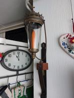 Antieke kandelaar hangend, Ophalen