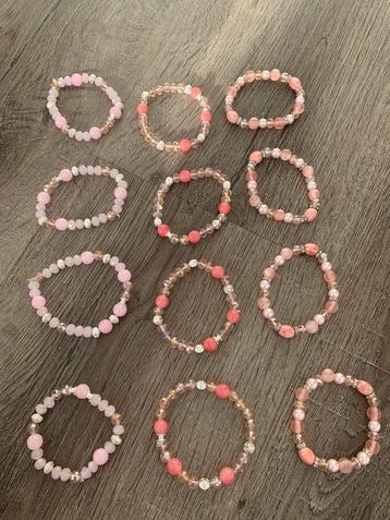Partij 12 stuks roze glas armbandjes 3 modellen A53 beschikbaar voor biedingen