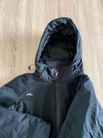 Zwarte Kjus ski jas met capuchon en sneeuwvangers 40 / L, Ophalen of Verzenden, Gedragen, Maat 42/44 (L), Jack
