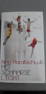 Nino Haratischwili - Het schaarse licht, Ophalen of Verzenden, Zo goed als nieuw, Nino Haratischwili