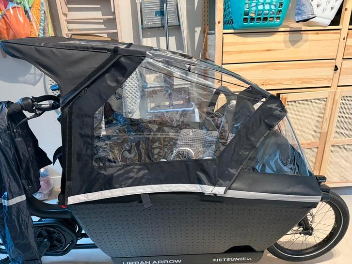 Regenhuif urban arrow plus - let op stiksel los bij 1 rits!, Fietsen en Brommers, Fietsaccessoires | Fietsaccu's, Gebruikt, Ophalen of Verzenden