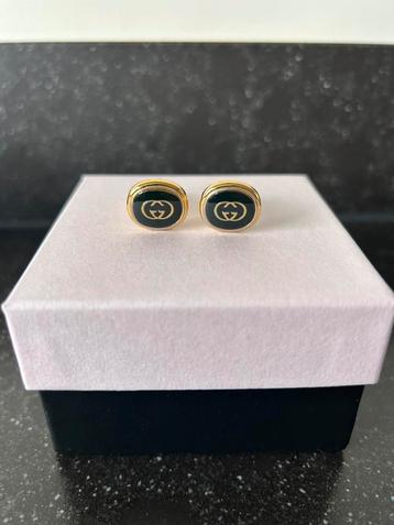 Vintage Manchetknopen van Gucci zwart goud beschikbaar voor biedingen