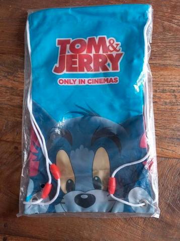 Beker met sinaasappelpers en tasje Tom en Jerry beschikbaar voor biedingen