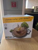 Boska Kaaskruller, Ophalen