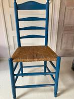 Oude met riet gevlochten stoel, Ophalen