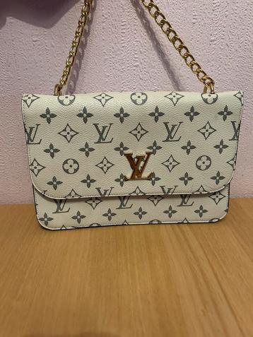 Witte Louis Vuitton tas beschikbaar voor biedingen