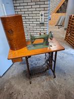 Antieke Husqvarna naaimachine., Ophalen