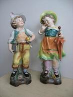 Porselein beelden 2 stuks  late 19e/vroege 202 eeuw, Ophalen