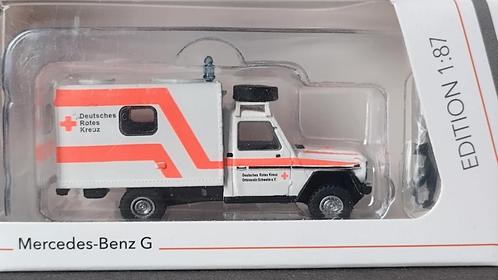 Mercedes Benz G Klasse Rotes Kreuz Krankenwagen Schuco Pol, Hobby en Vrije tijd, Modelauto's | 1:87, Nieuw, Auto, Schuco, Verzenden